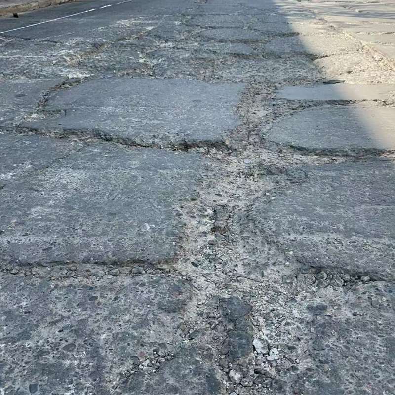合川路面起砂露石子修补料